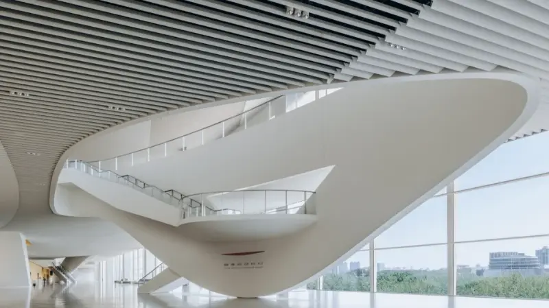 The Ceiling as Architecture: Aluminum Forms in the China National Convention Center